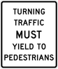 TURNING TRAFFIC MUST YIELD TO